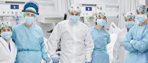 medical personnel in hospital gear