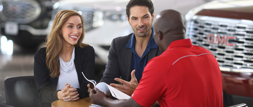 New car buying asking their dealer questions