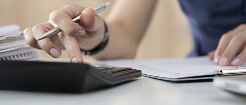 woman calculating her personal finances