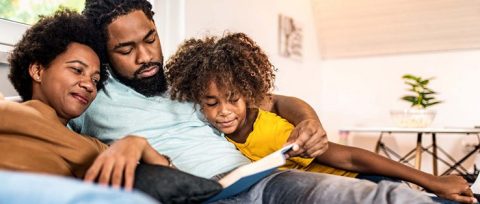 A family reading a book