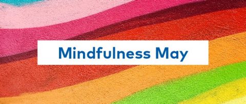 A rainbow background with "Mindfulness May" text overlay.