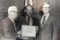 Thomas J. Simon accepting an award