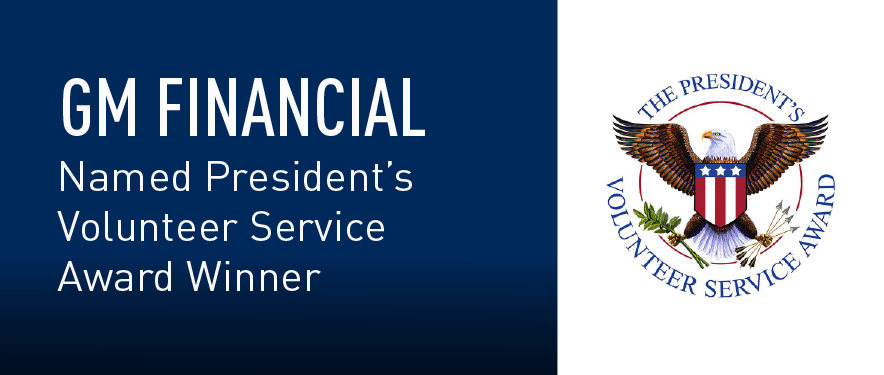 U.S. President’s Volunteer Service Award logo beside a blue background with text overlay "GM Financial Named President's Volunteer Sevice Award Winner"
