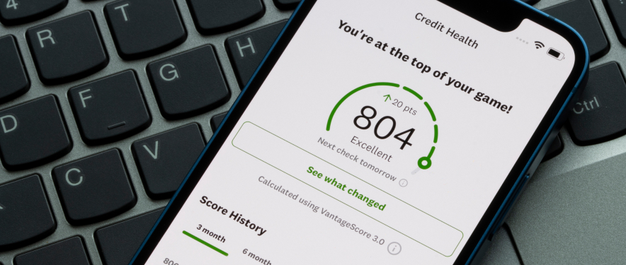 Person reviewing credit score on smartphone.